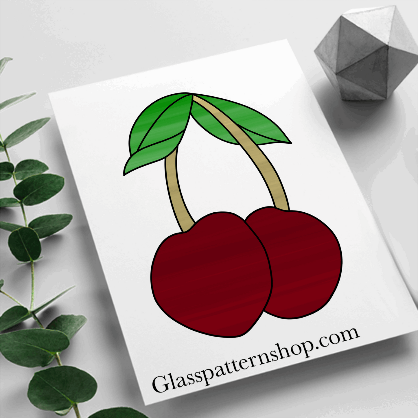 A printable stained glass pattern featuring two cherries with leaves, designed for customisation with various glass colours and textures.