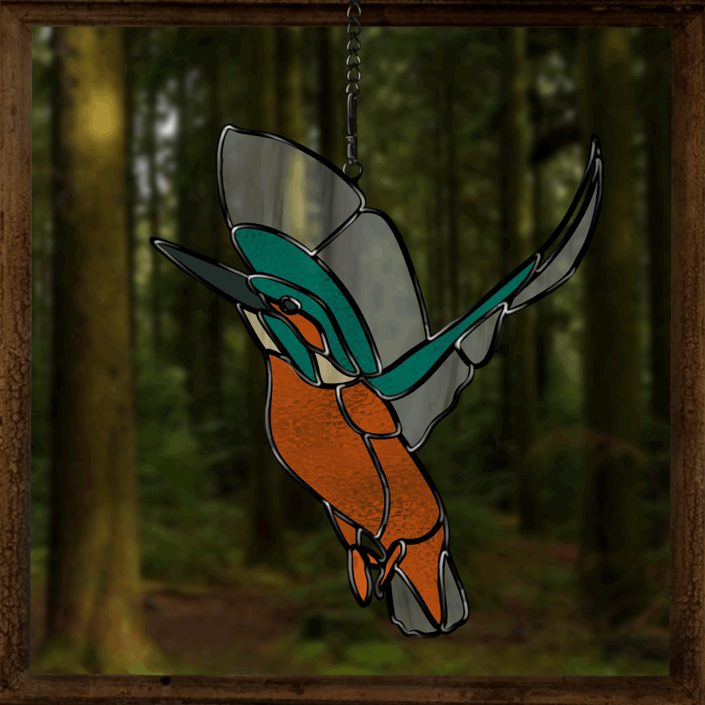 A vibrant stained glass pattern of a Kingfisher in flight, ideal for suncatchers and decorative panels.