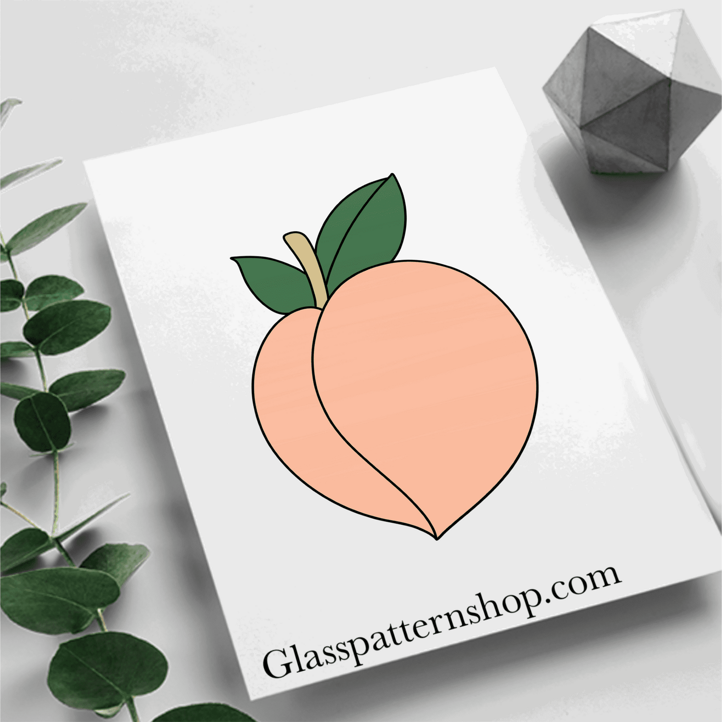 A stained glass pattern featuring a peach with detailed leaves, designed for vibrant and customisable stained glass projects.