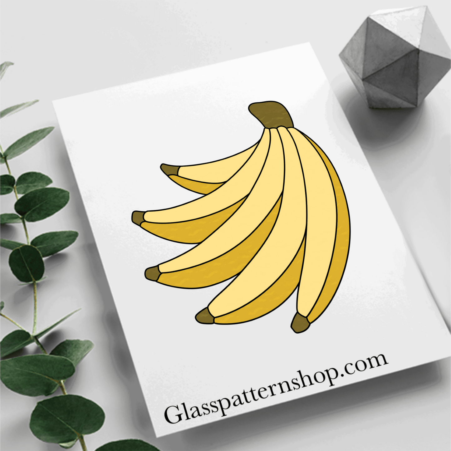 A printable stained glass pattern featuring a bunch of bananas, designed for easy customisation with various glass colours and textures.
