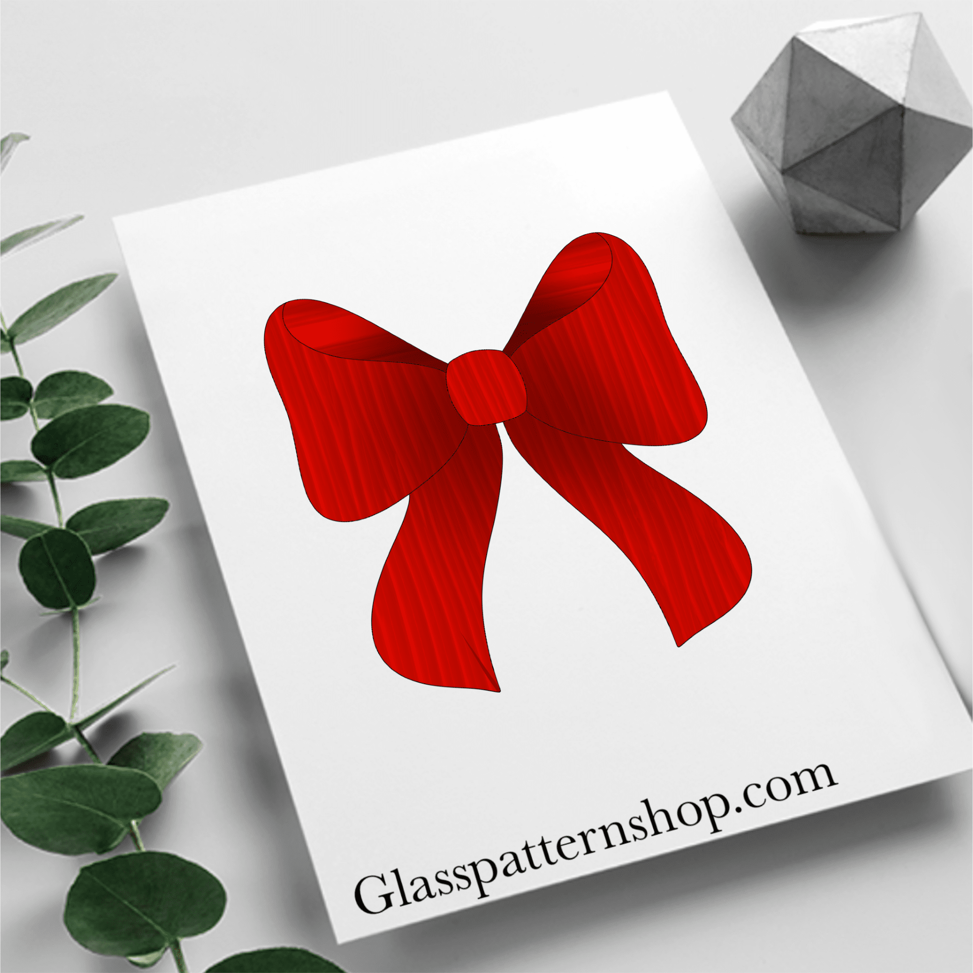 Digital stained glass pattern with a decorative bow, ideal for holiday or gift-themed designs.