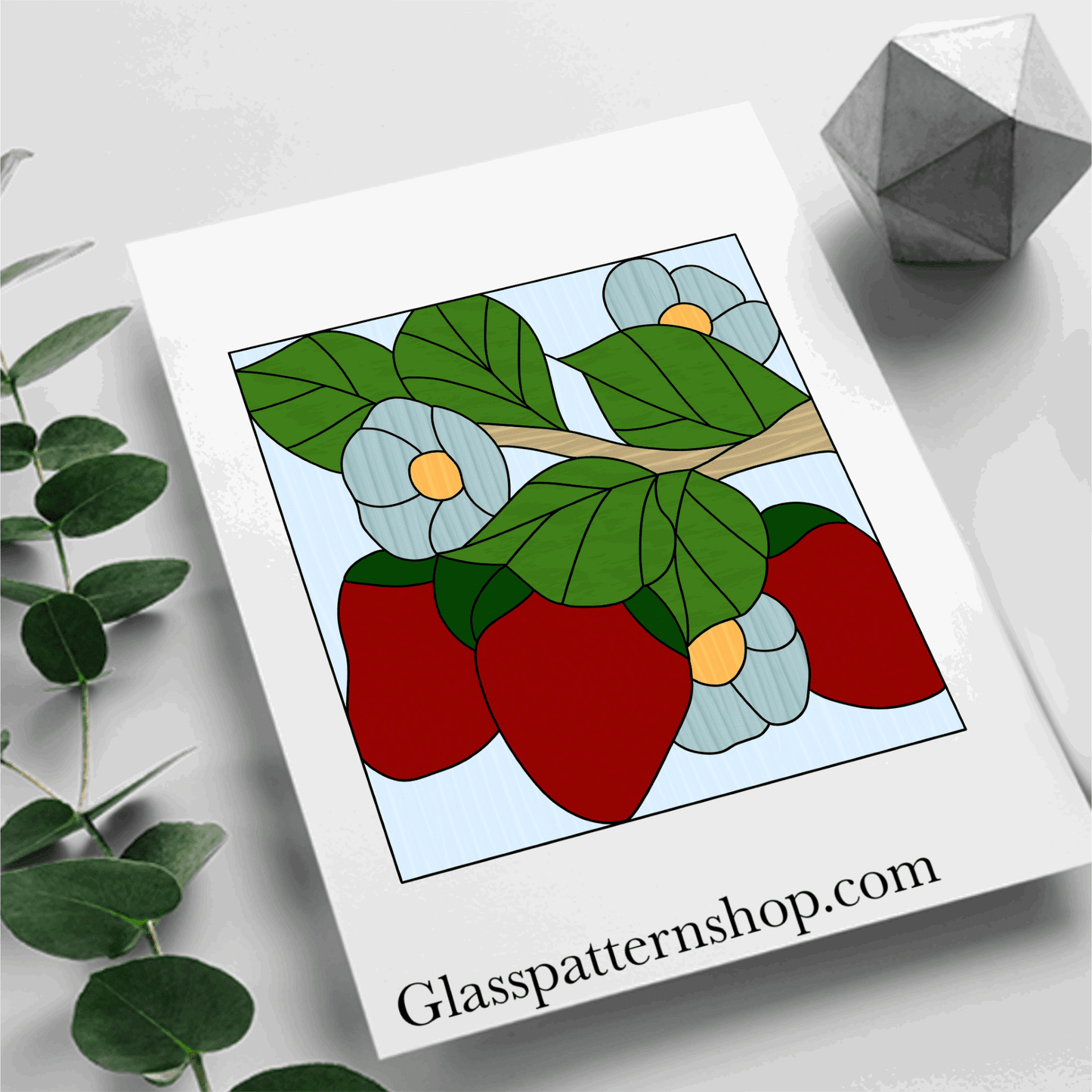 A stained glass pattern featuring a strawberry plant with ripe strawberries, flowers, and leaves, set within a square shape for versatile stained glass projects.