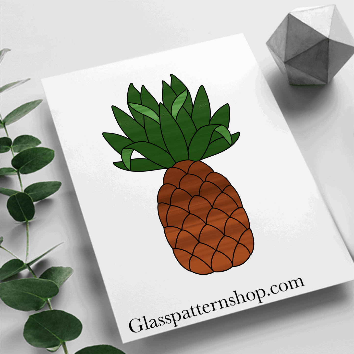 A stained glass pattern featuring a pineapple with detailed leaves, designed for tropical and customisable stained glass projects.