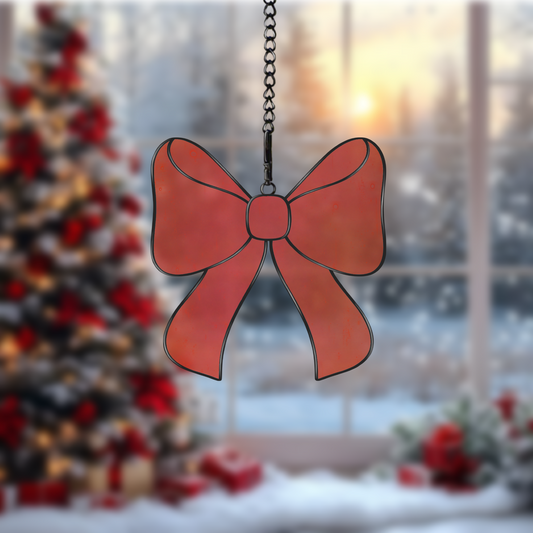 Digital stained glass pattern with a decorative bow, ideal for holiday or gift-themed designs.