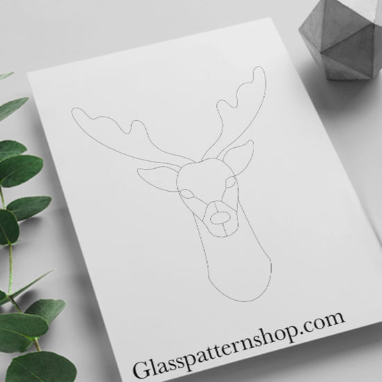 Digital stained glass pattern featuring a festive reindeer head, ideal for Christmas or holiday-themed designs